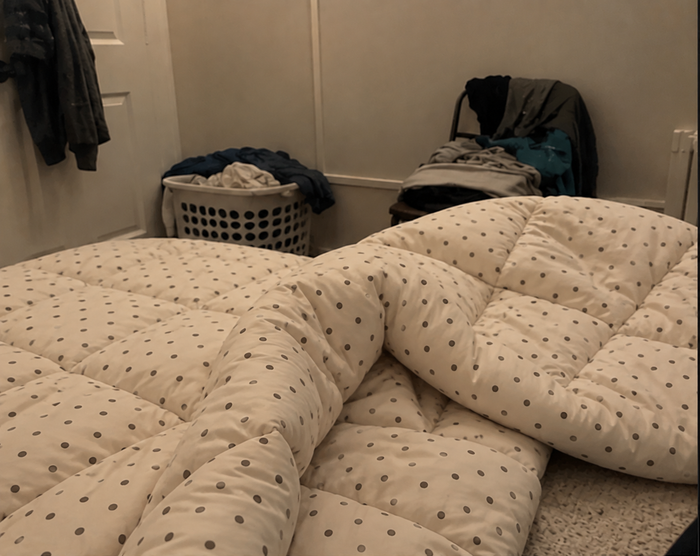 AI-generated demo image of the HelloBed Sand Dot comforter in a home setting.