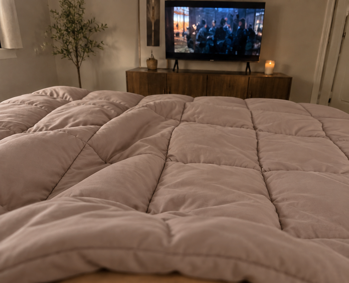 AI-generated demo image of the HelloBed Taupe comforter in a home setting.