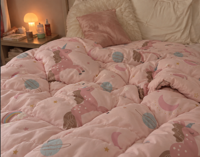 AI-generated demo image of the HelloBed Unicorn comforter in a home setting.